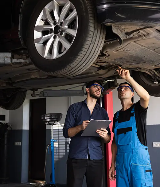 auto repair shop conducting a vehicle